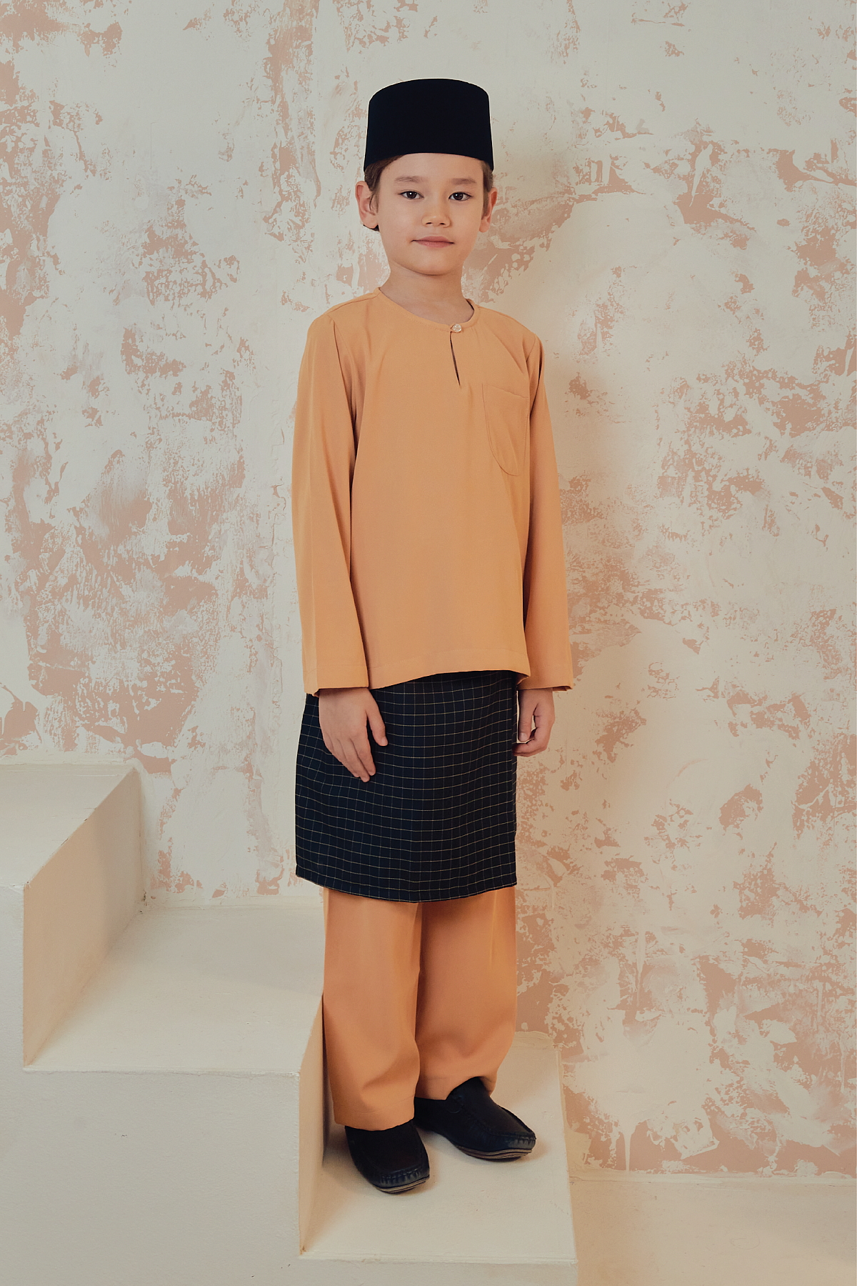 NADEM KIDS IN ORANGE